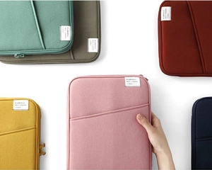 Bunte stoßfeste Laptoptaschen mit Fronttaschen in Rosa, Gelb und Blau im Überblick