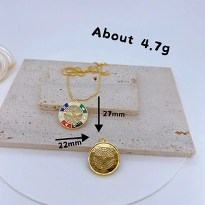 Gold-plated Evil Eye pendant with colorful enamel and pavé zircon on beige stone