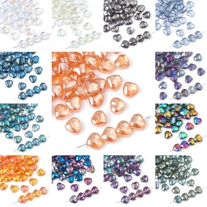 Colorful 10mm heart-shaped glass crystal beads in thirteen vibrant shimmering shades