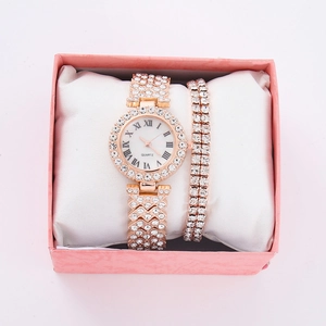 Rose gold quartz watch and rhinestone bracelet set in a pink gift box presentation