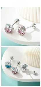 Detailed tile display of pink and blue shell stud earrings with starfish and rhinestones
