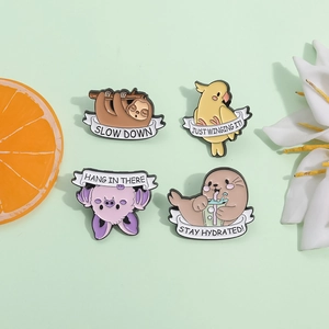 Set of cute animal enamel pins with sloth and parrot on light green background