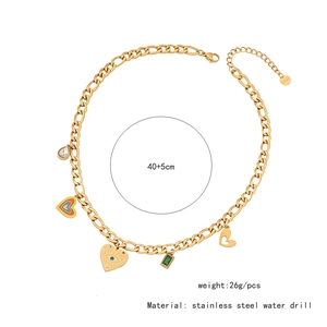 Detailed view of stainless steel Figaro chain necklace with colorful enamel heart pendants