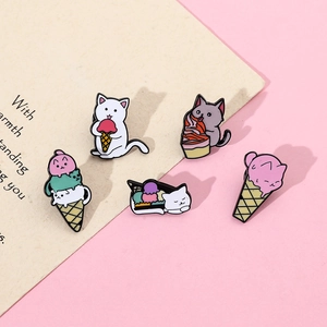 Detailed close-up of five colorful enamel cat and ice cream cone alloy lapel pins