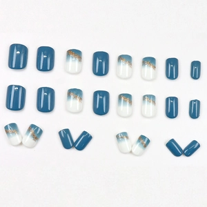 Reusable 24pcs hazy blue press-on nails set with gold foil accents and glossy finish