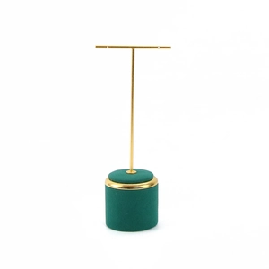 T-bar earring display stand with emerald velvet base and golden metal frame