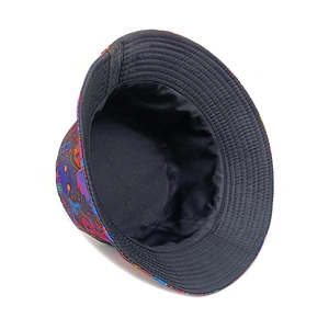 Detailed top view of a bucket hat featuring psychedelic mushroom and skull patterns