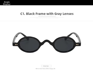 Detail view of oval steampunk sunglasses with black frame, gray lenses and metal rivets