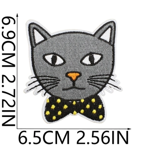 Detailed embroidery patch of a grey cat with yellow polka dot bow, size 6.5x6.9cm