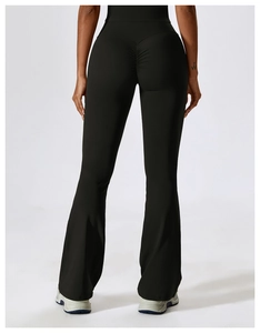 Close-up of high-waist yoga flare pants showing scrunch butt lift detail in black