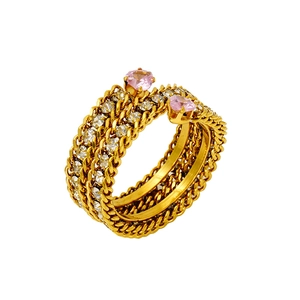 Detailed macro view of 18K gold plated double cuban link ring with pink heart zircons
