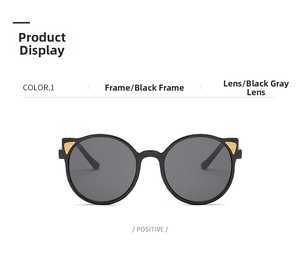 Front view of black cat-ear kids sunglasses with gold trim and dark grey lenses