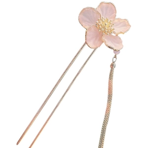 Traditional style pink peach blossom hair pin with golden tassels on white background