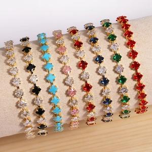 Detail of 18k gold plated spacer beads with square cubic zirconia in eight various colors