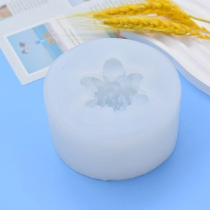 3D flower silicone mold for DIY cake baking and soap making on a blue background