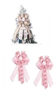 Close-up of double-layer linen Christmas bows with festive deer and cedar prints