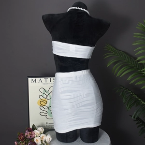 Detail of white two-piece skirt set with wave texture fabric and backless tube top design