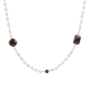 Elegant multi-layer gold necklace with pearls and black faceted geometric stones