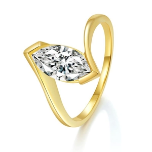 Minimalist 18k gold plated silver ring featuring a marquise cut moissanite stone