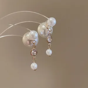 Elegant gold double-sided pearl earrings with sparkling zircon stones for women