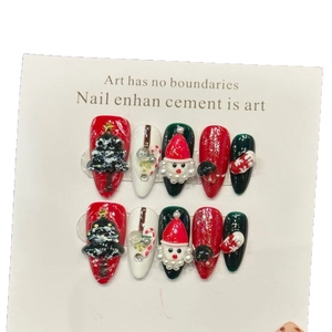 3D Christmas press-on nails set featuring Santa Claus and Christmas tree designs
