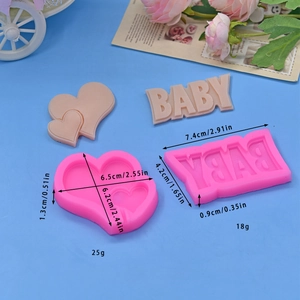 Pink silicone baby and heart molds for DIY cake mousse baking with detailed size dimensions