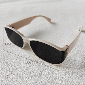 Detailed view of beige retro sunglasses frame with dimensions 14cm width and 4.5cm height