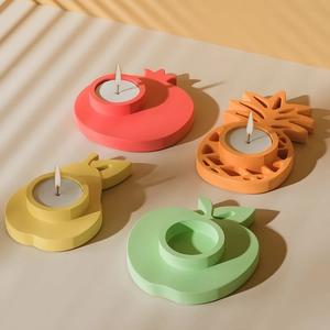 Creative fruit-shaped candle holder set with apple, pear and pomegranate designs