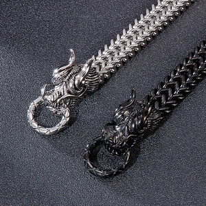Mens vintage stainless steel dragon head bracelet with ornate bone chain design