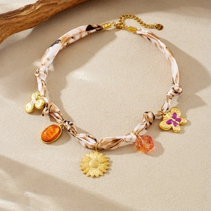 Vintage gold sunflower and butterfly silk ribbon necklace with stainless steel charms