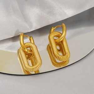 Elegant 18K gold-plated stainless steel oval hoop earrings with twisted spiral texture