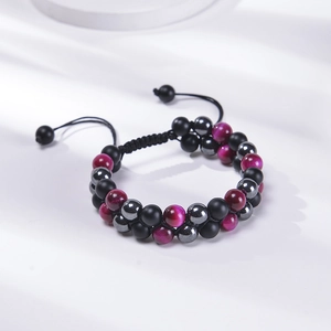 Detail of double-layer woven bracelet with 8mm tiger eye and matte agate beads