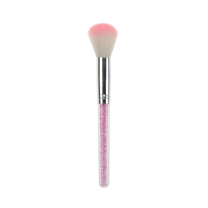 Detail of pink gradient makeup brush with sparkling crystal filled handle and silver ferrule