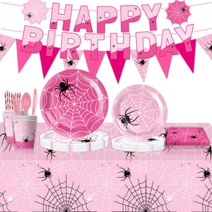 Pink and black spider web theme party supplies including plates, cups and banner