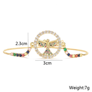 Detail showing dimension of 18K gold plated dove bracelet with multicolor cubic zirconia