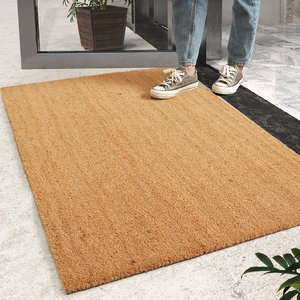 Natural coconut fiber doormat for entryway showing durable brown texture and anti-slip backing