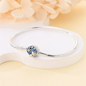 Starry night silver snake chain bracelet with blue and clear crystal spherical clasp