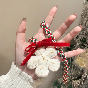 Festive Christmas snowflake pendant necklace with red velvet bow and embroidery
