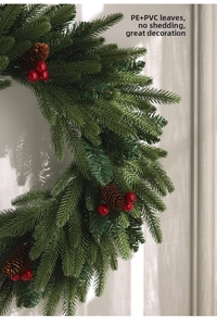 Detailed close-up of Christmas wreath featuring no-shedding PE leaves, pinecones and red berries