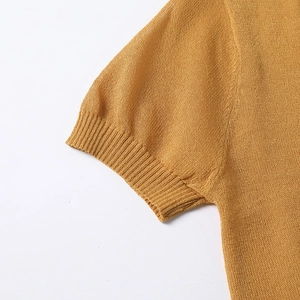 French style ginger yellow knit POLO shirt sleeve detail with ribbed cuff design