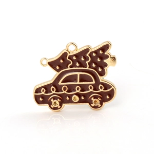 Detail view of brown enamel Christmas car with tree pendant in golden metal finish