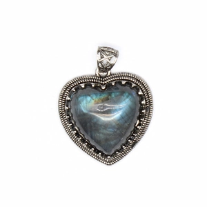 Natural labradorite heart pendant with vintage silver woven frame on white background