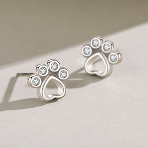 S925 sterling silver heart-shaped bear paw stud earrings with micro-set sparkling crystals