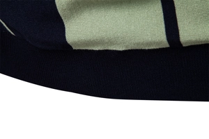 Macro shot of striped knit fabric with navy ribbed cuff detail for men's polo shirt