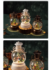 Detail of Christmas lantern water globe with Santa and swirling glitter effect