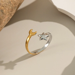 Elegant bicolor stainless steel open ring featuring star and moon charms with heart shadow