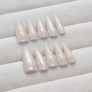 Handmade pearlescent white aurora cat eye press-on nails in long almond shape