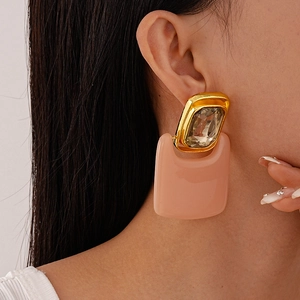 Exaggerated geometric resin drop earrings with grey square crystal in gold metal frame