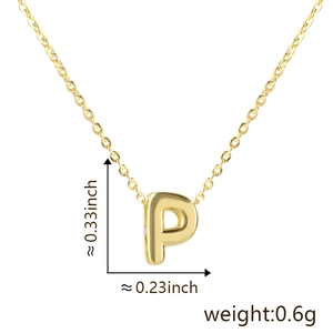 Detail view of gold letter P pendant showing dimensions 0.33 x 0.23 inch and weight 0.6g