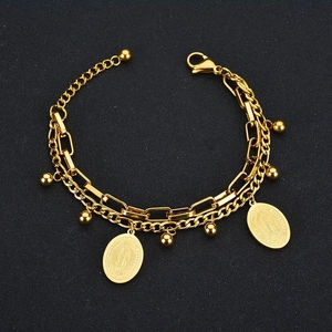 Close-up of double-layer gold chain bracelet with Virgin of Guadalupe oval charms